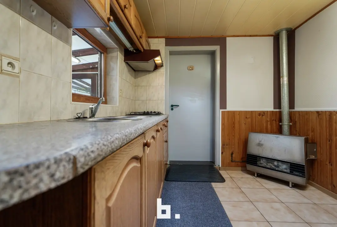 Te renoveren halfopen bebouwing 600m²met ruime tuin en garage op uitstekende ligging. - Sint-Andries