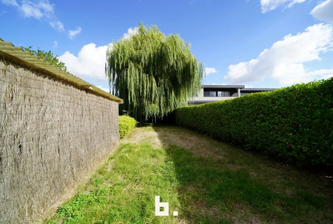 Gezellige woning met zonnige tuin, carport en garage te Oedelem - Oedelem