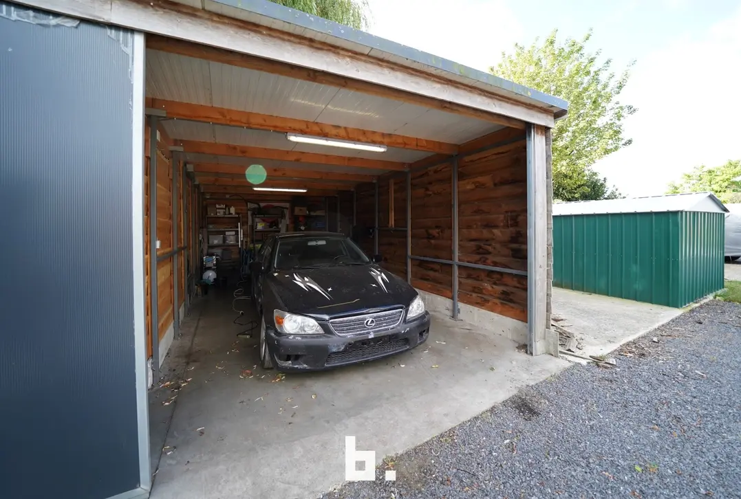 Gezellige woning met zonnige tuin, carport en garage te Oedelem - Oedelem