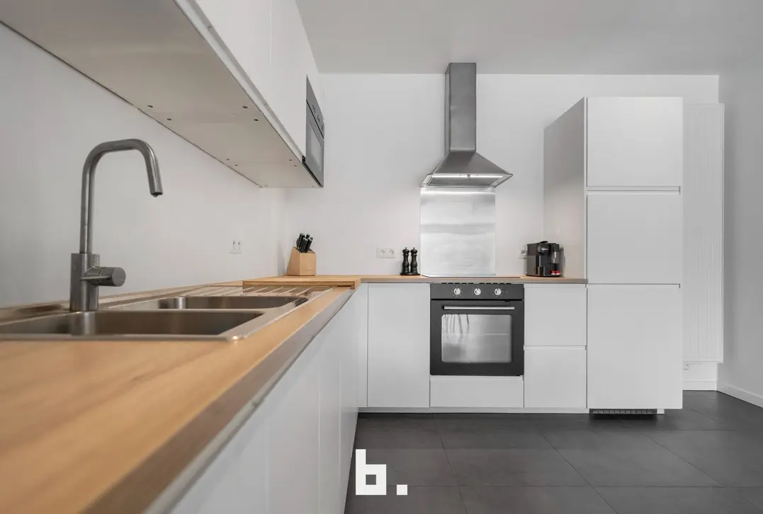 Perfect instapklare woning met gezellige tuin op uitstekende ligging - Sint-Kruis