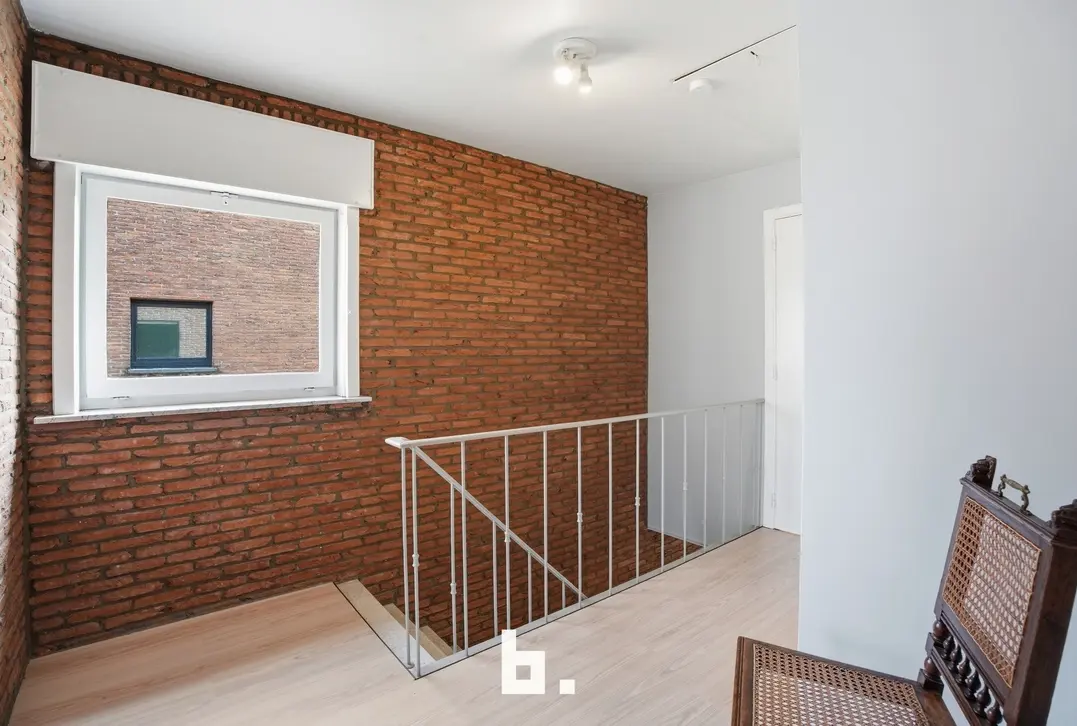 Halfopen gezinswoning met tuin, oprit en garage - Kortrijk - €315.000