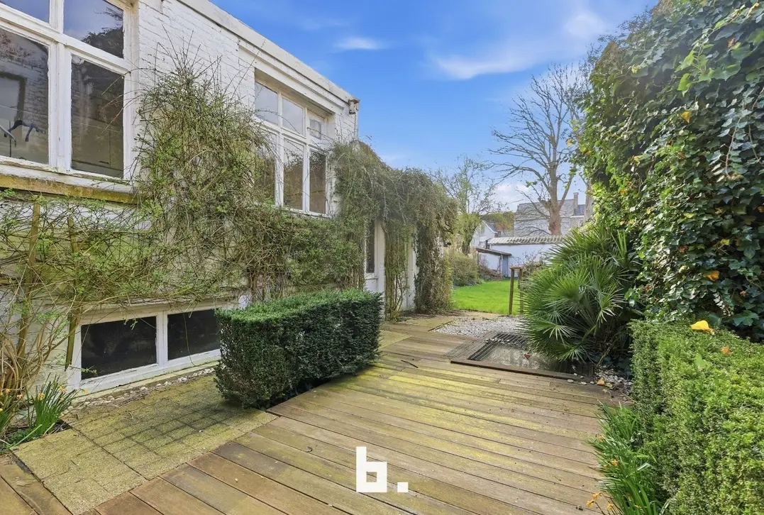 Handelshuis met woonst en tuin op toplocatie in centrum - Izegem