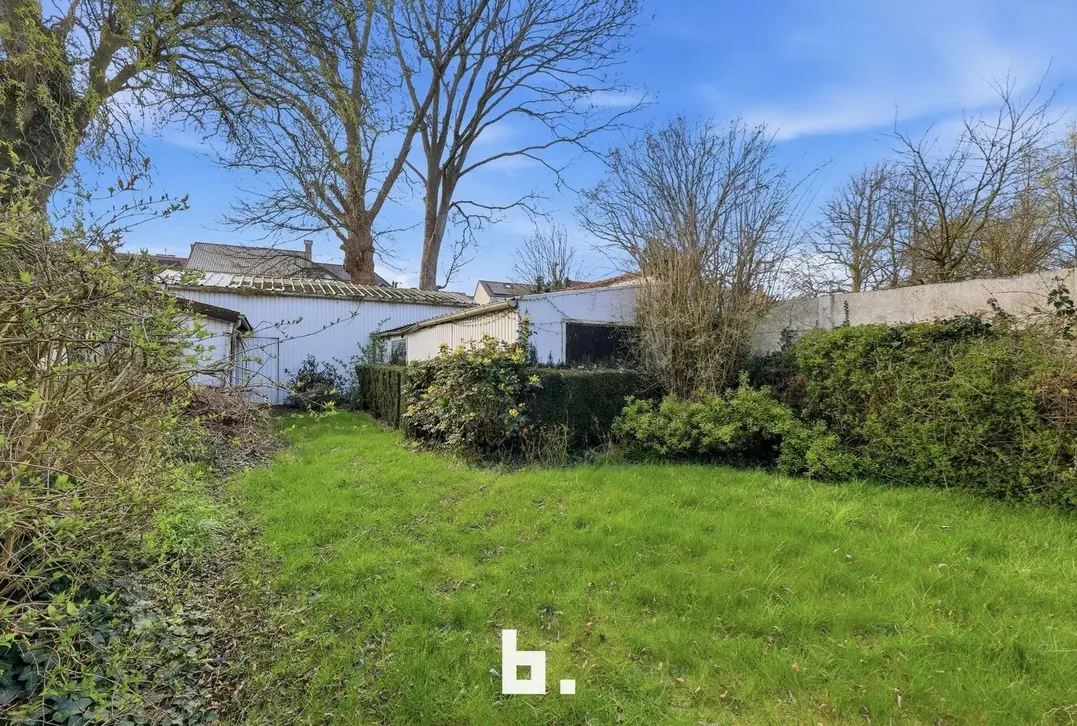 Handelshuis met woonst en tuin op toplocatie in centrum - Izegem