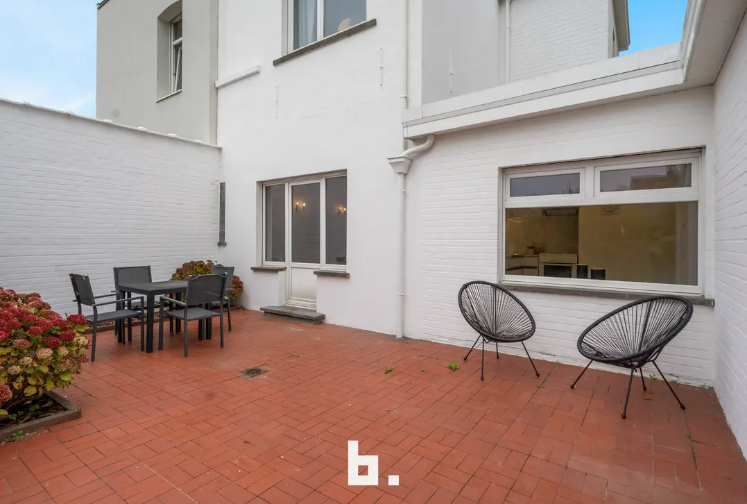 Energiezuinige gezinswoning met 3 slaapkamers en zonnige tuin te Brugge. - Brugge
