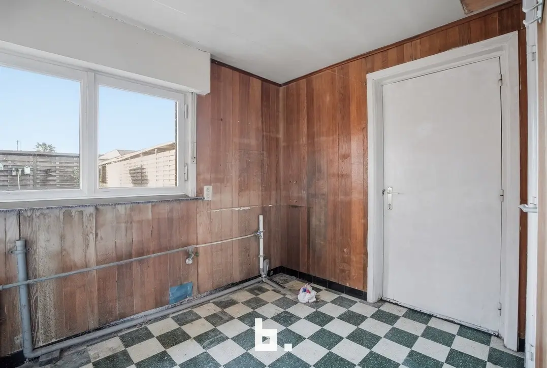 Charmante halfopen woning met tuin en carport in rustige straat-0 Kortrijk-€235.000