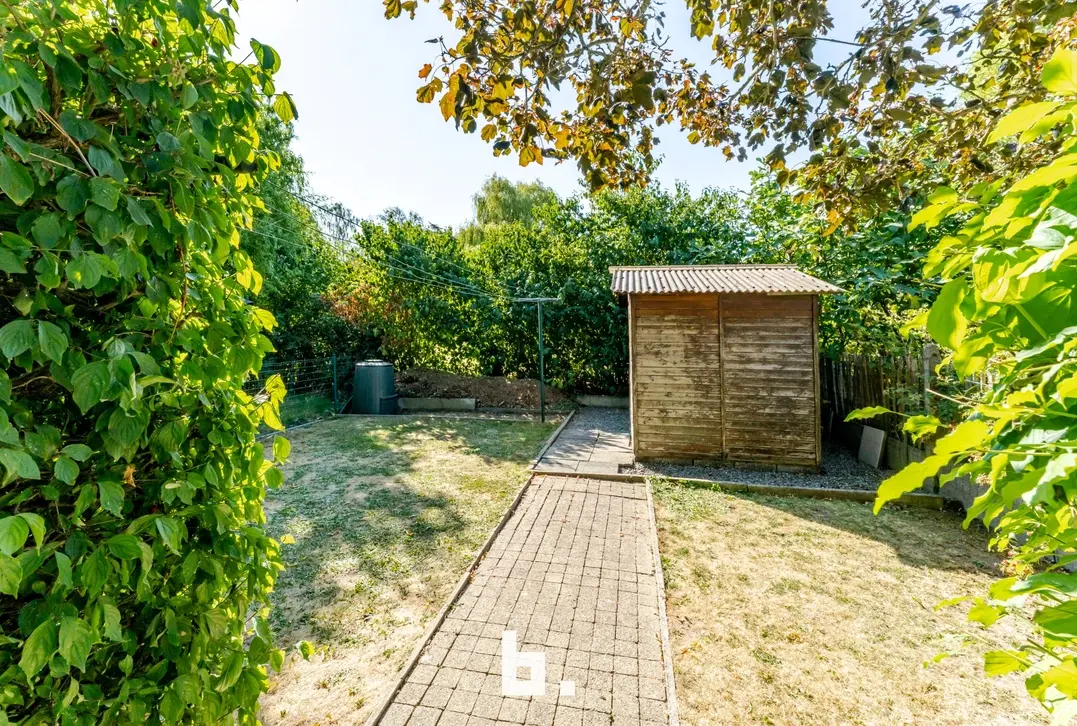 RIJWONING MET ZEER RUIME TUIN TE KOOP – HARELBEKE-STASEGEM - Harelbeke