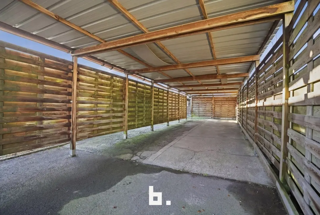 Charmante halfopen woning met tuin en carport in rustige straat-0 Kortrijk-€235.000