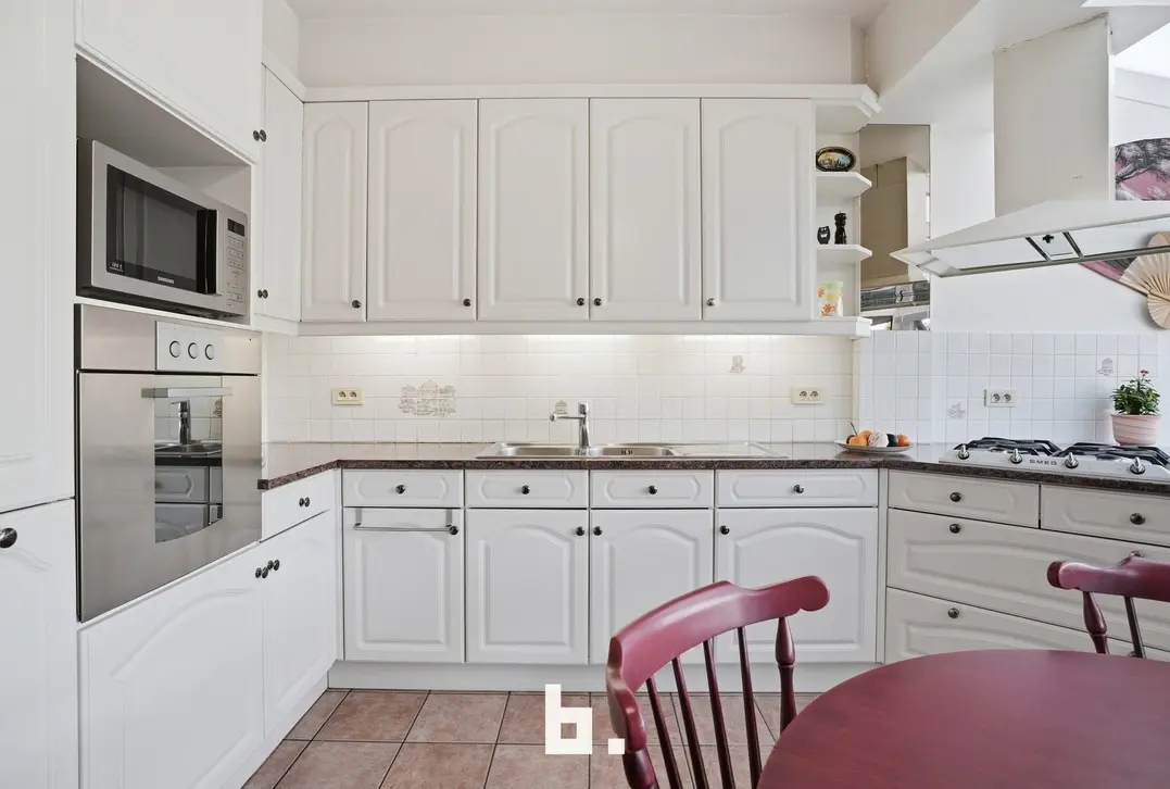 Halfopen gezinswoning met tuin, oprit en garage - Kortrijk - €315.000