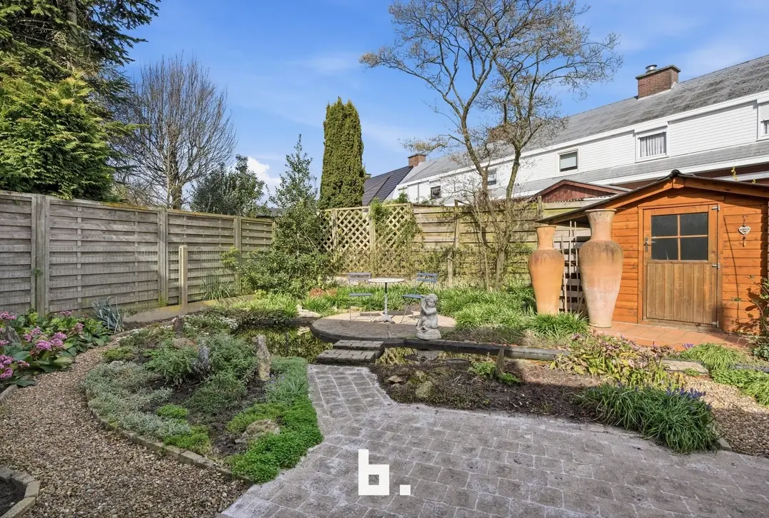 Halfopen gezinswoning met tuin, oprit en garage - Kortrijk - €315.000