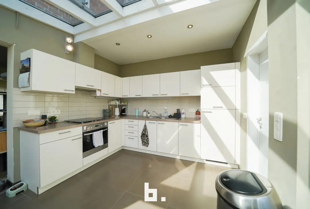 Gezellige woning met zonnige tuin, carport en garage te Oedelem - Oedelem