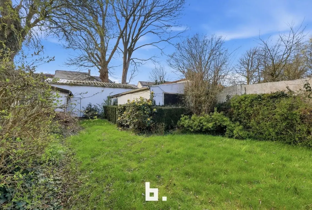 Handelshuis met woonst en tuin op toplocatie in centrum - Izegem