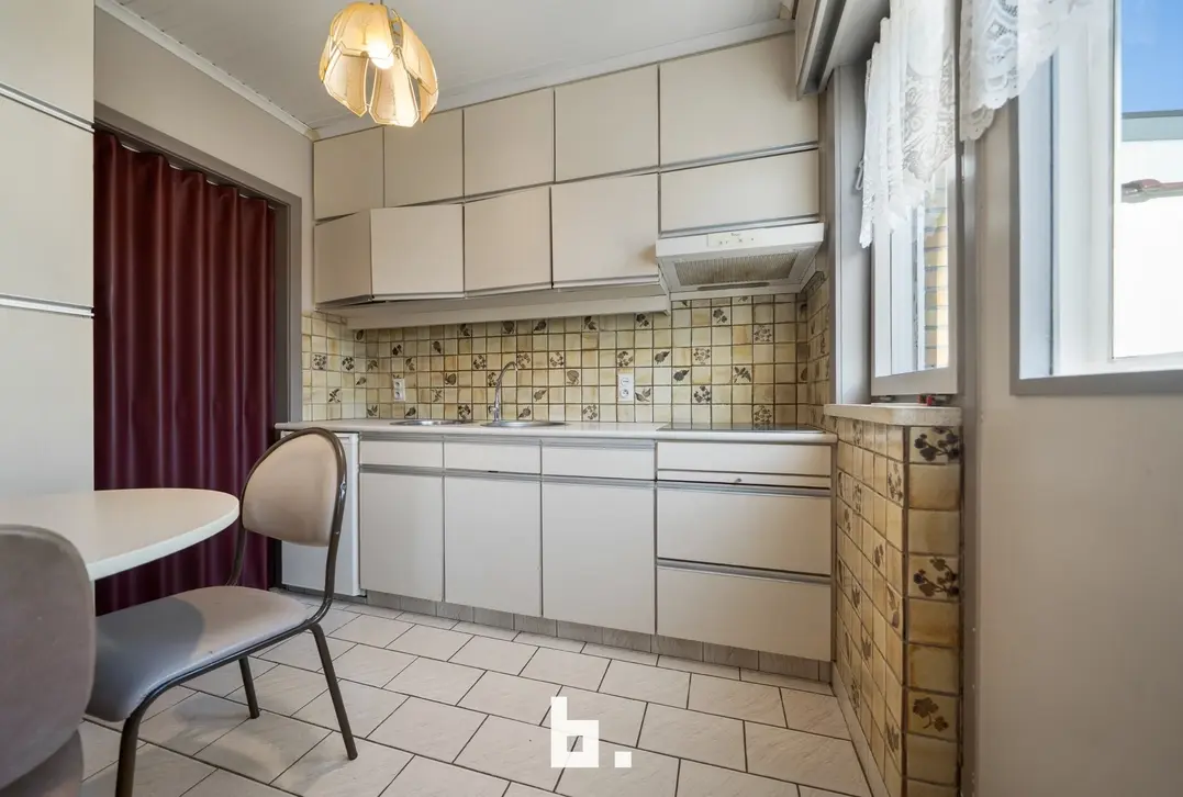 Woonhuis met 3 slaapkamers, zonnige tuin en garage te koop in rustige wijk - Oostkamp