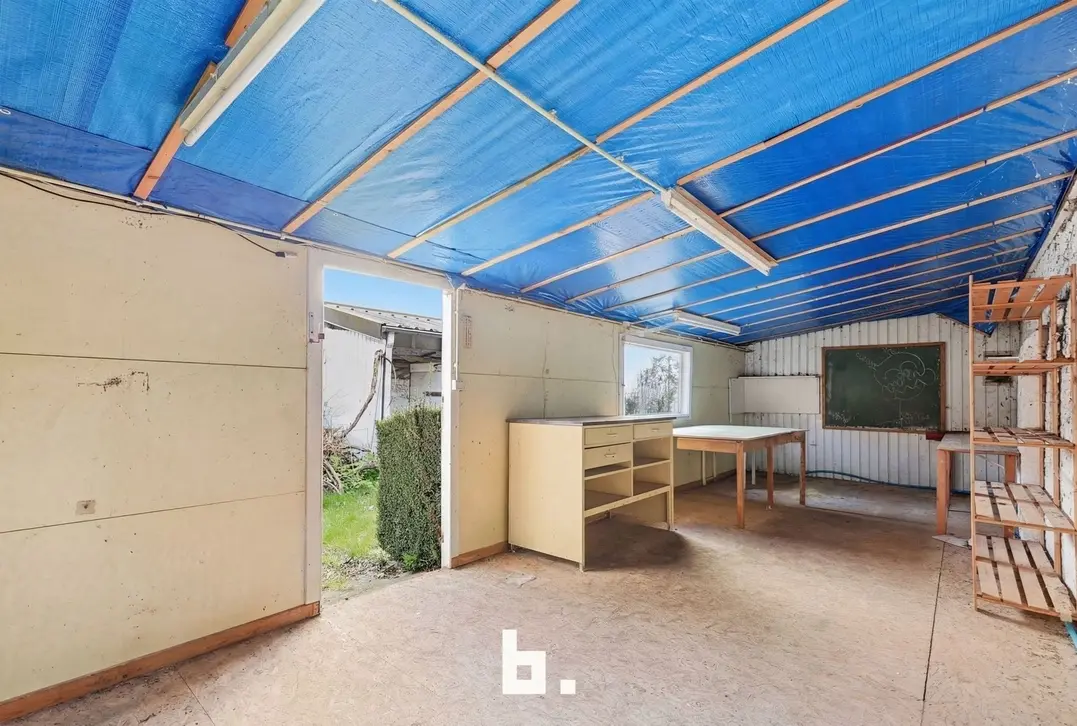 Handelshuis met woonst en tuin op toplocatie in centrum - Izegem