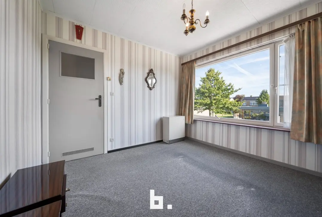 Woonhuis met 3 slaapkamers, zonnige tuin en garage te koop in rustige wijk - Oostkamp