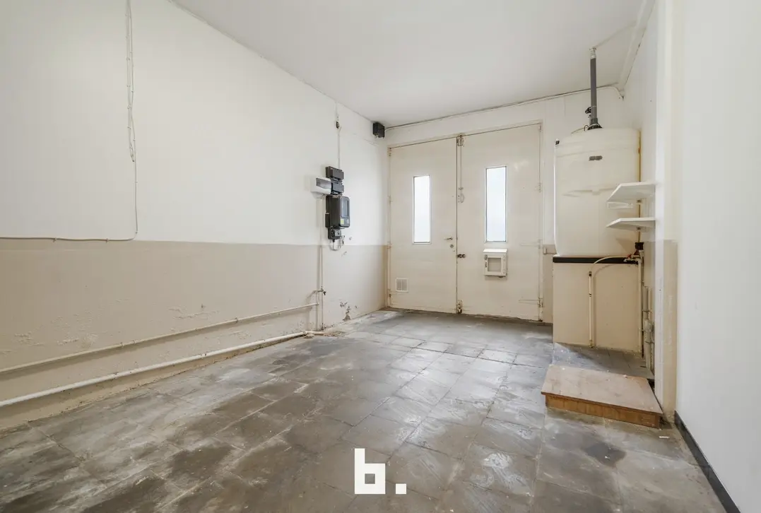 Energiezuinige gezinswoning met 3 slaapkamers en zonnige tuin te Brugge. - Brugge