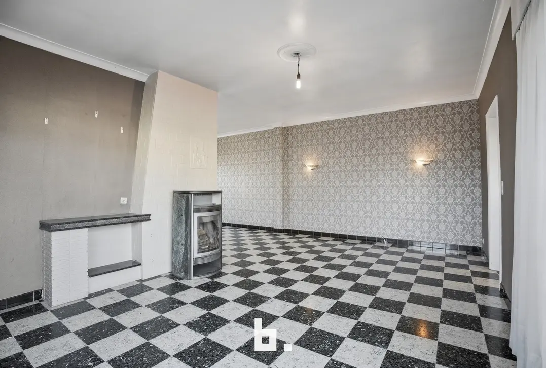 Charmante halfopen woning met tuin en carport in rustige straat-0 Kortrijk-€235.000