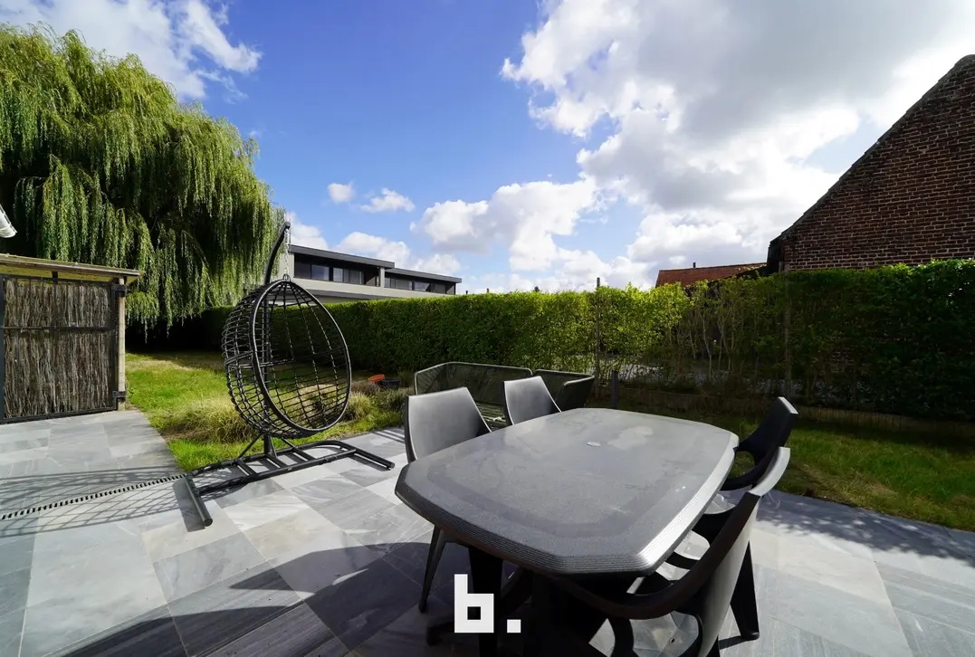 Gezellige woning met zonnige tuin, carport en garage te Oedelem - Oedelem