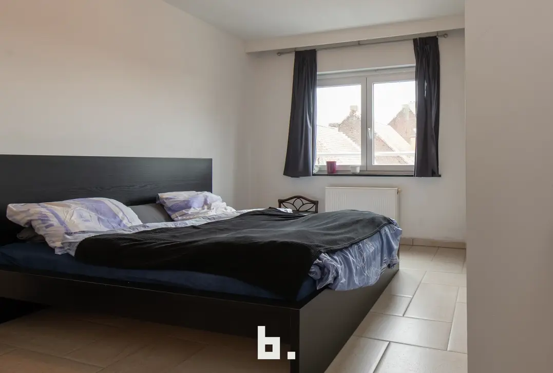 Stabiel verhuurd appartement met 5% rendement op topligging te centrum Menen - Menen