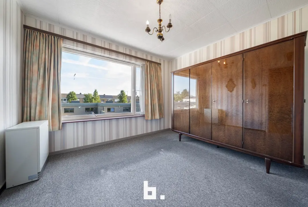 Woonhuis met 3 slaapkamers, zonnige tuin en garage te koop in rustige wijk - Oostkamp