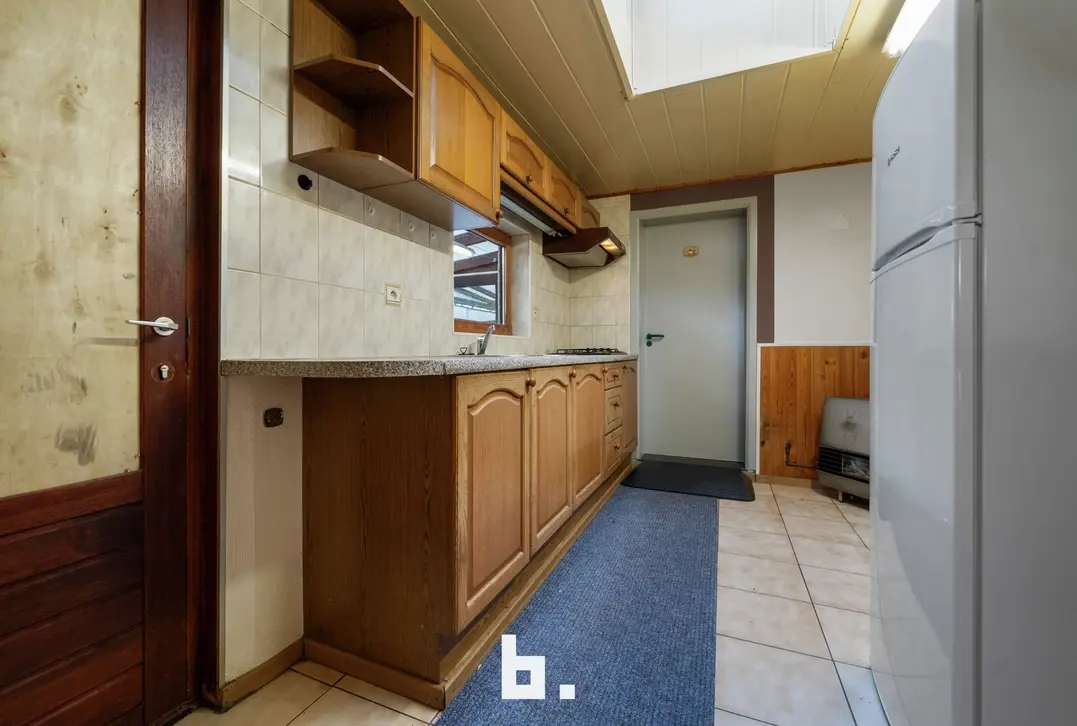 Te renoveren halfopen bebouwing 600m²met ruime tuin en garage op uitstekende ligging. - Sint-Andries