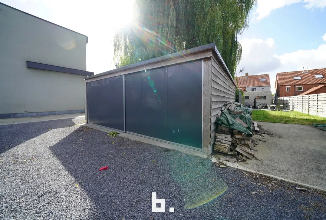 Gezellige woning met zonnige tuin, carport en garage te Oedelem - Oedelem