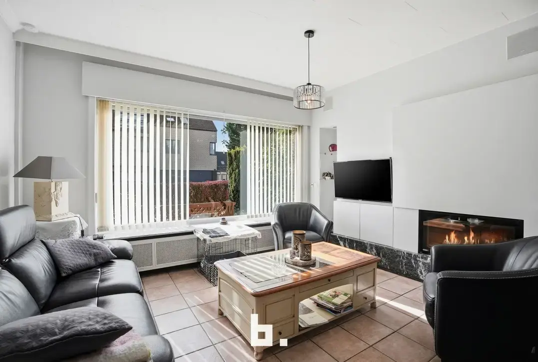 Halfopen gezinswoning met tuin, oprit en garage - Kortrijk - €315.000