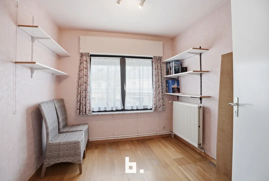 Halfopen gezinswoning met tuin, oprit en garage - Kortrijk - €315.000