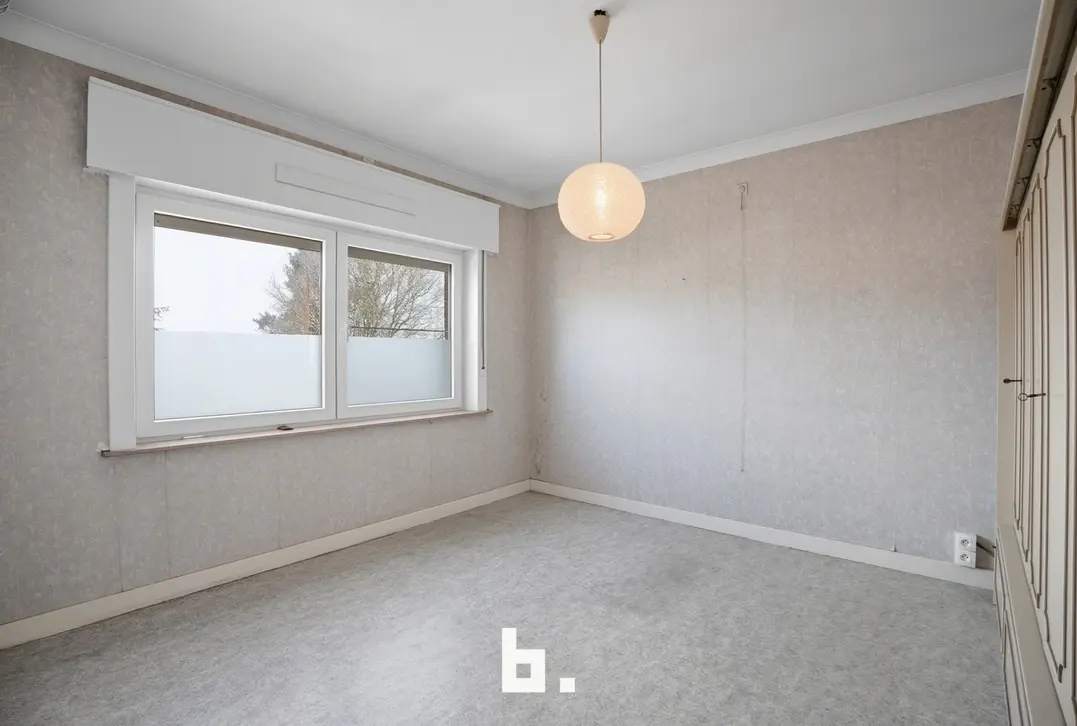 Charmante halfopen woning met tuin en carport in rustige straat-0 Kortrijk-€235.000