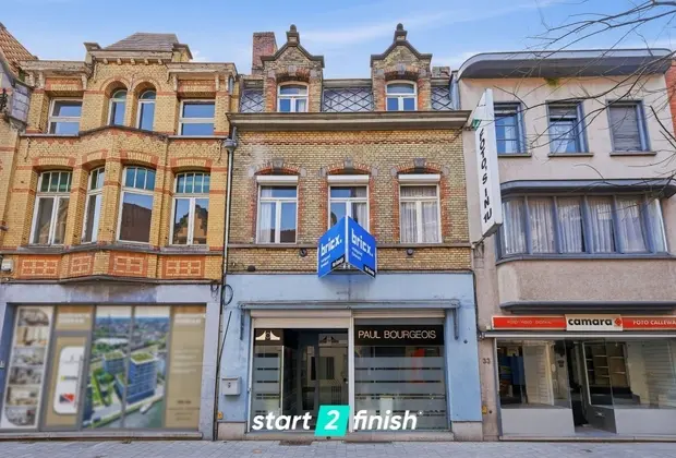 Handelshuis met woonst en tuin op toplocatie in centrum - Izegem