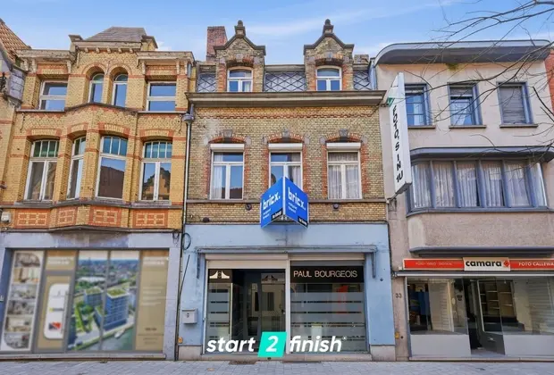 Handelshuis met woonst en tuin op toplocatie in centrum - Izegem